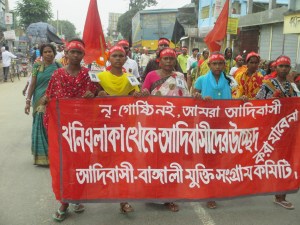 We are not nri-gushti (a derogatory term recently introduced by the Bangladesh government for the ethnic minorities) we are adibashi (A preferable term for indigenous people). Their banner says: “Displacement of adibashi from the mining vicinity will not be tolerated”. They are organized under Adibashi-Bengali mukti shongram committee.